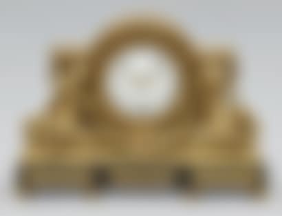 Cartonnier clock in chiseled and gilded bronze representing winged putti on either side of the dial, a garland of fruit and flowers in the base. (preview)