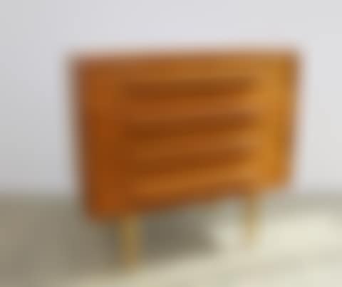 A four door Danish teak chest of drawers (preview)