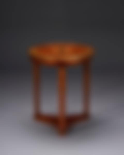 A CONSULAT ORMOLU-MOUNTED EBONY AND PEWTER INLAID FLAME MAHOGANY AND 'ACAJOU MOUCHETE' GUERIDON (preview)