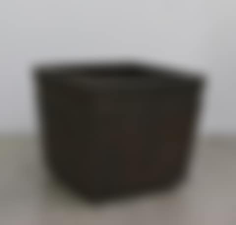 A pair of smaller metal planters (preview)