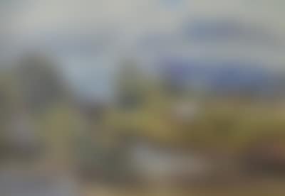 A river landscape with a man and woman picnicking at the water"s edge (preview)