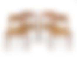 Four Niels Otto Møller teak and sea grass ‘No 75" dining chairs (preview)