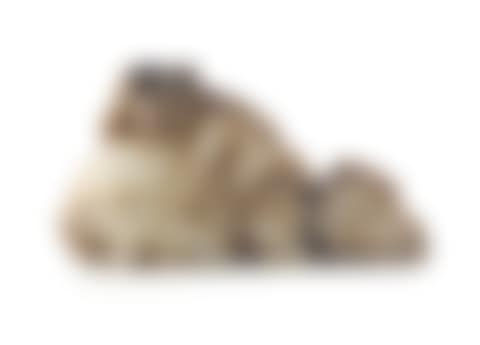 A Chinese mottled grey and white jade carving of a small boy astride a fish (preview)
