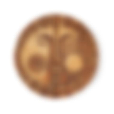 Ornement circulaire mural en grès stylisant un visage estampé en bas-relief (preview)