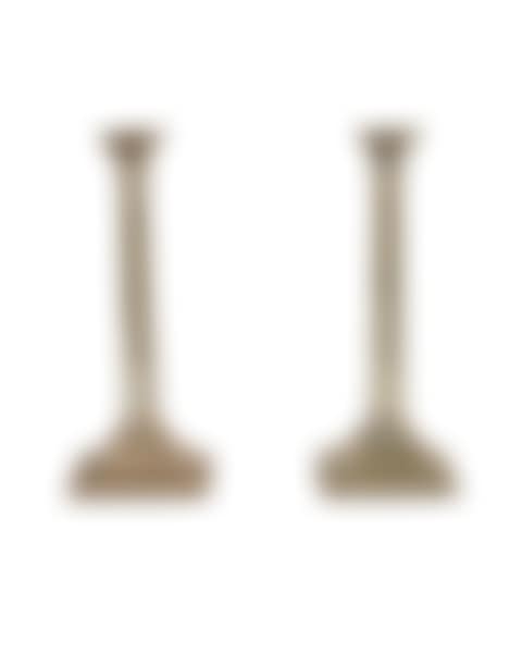 A pair of white metal Corinthian column candlesticks (preview)