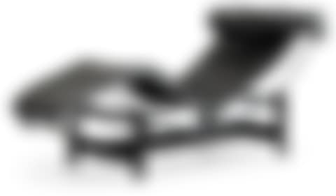 A Le Corbusier "LC 4" black leather and chromed steel reclining chair (preview)