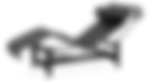 A Le Corbusier "LC 4" black leather and chromed steel reclining chair (preview)