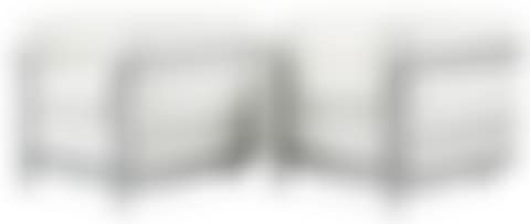 A pair of Le Corbusier, "LC2" chromed steel and white leather easy chair (preview)