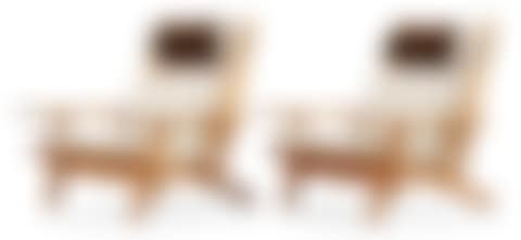 A pair of Hans J Wegner oak and fabric easy chairs (preview)