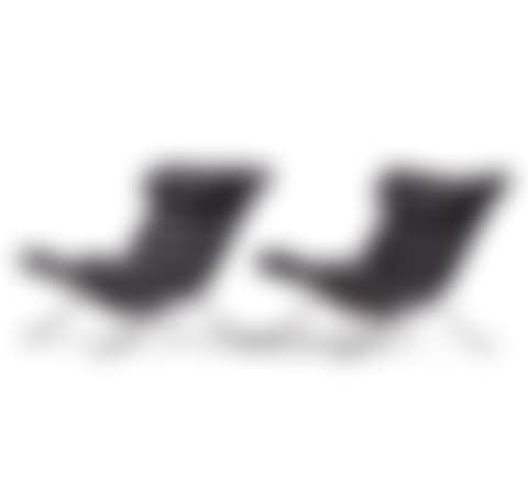 a pair of black leather "Ari" lounge chairs (preview)