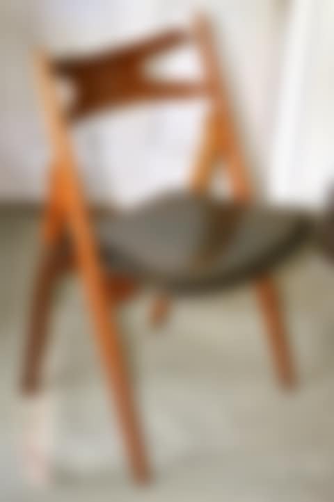 A HANS WEGNER TEAK FRAMED "SAWBACK" CHAIR (preview)