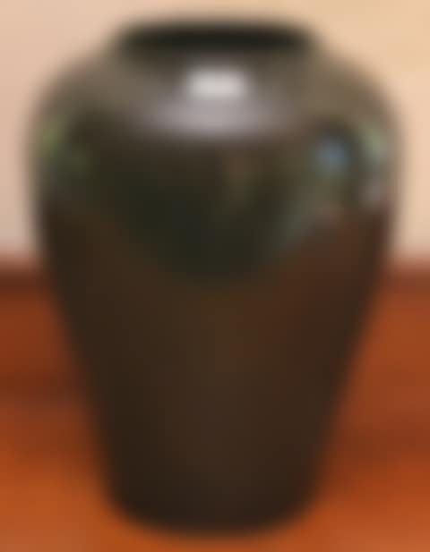 A BLACK GLAZED GERMAN CERAMIC VASE (preview)