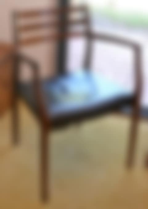 A DANISH ROSEWOOD FRAMED ARMCHAIR WITH A SLATTED BACK (preview)