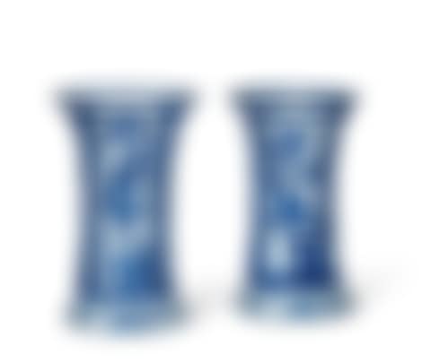 A PAIR OF CHINESE PORCELAIN BLUE AND WHITE MOLDED BEAKER VASES (preview)