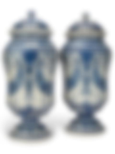 A LARGE PAIR OF FRENCH FAIENCE BLUE AND WHITE JARS AND COVERS (preview)