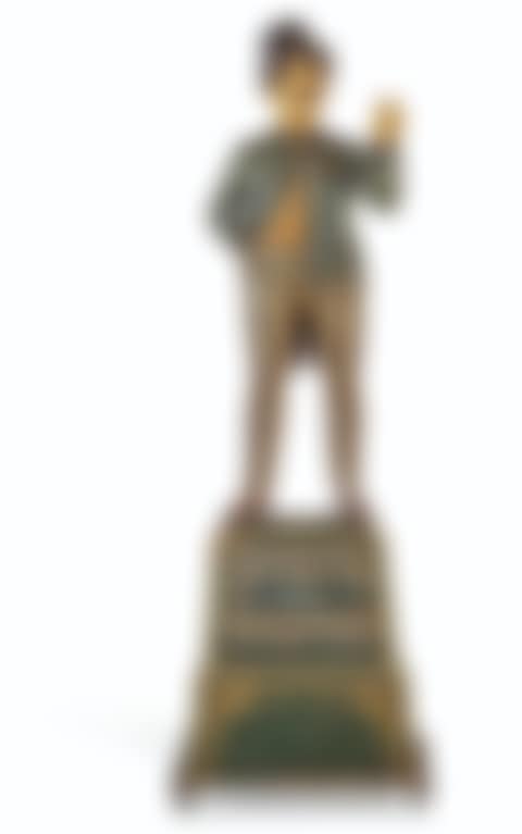 A CARVED AND POLYCHROME PAINT-DECORATED CIGAR STORE FIGURE OF A 'RACETRACK TOUT' (preview)
