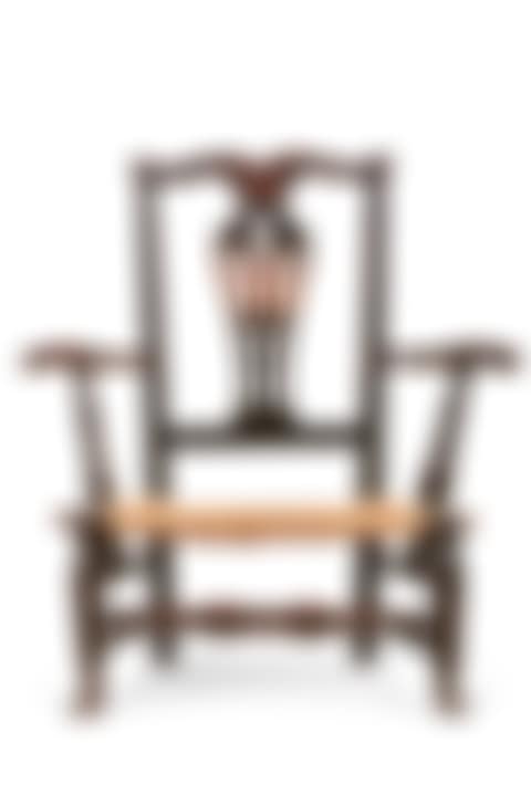 A CHIPPENDALE BLACK-PAINTED MAPLE SLIPPER ARMCHAIR (preview)