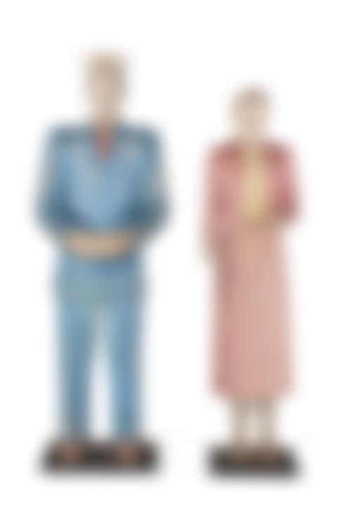 A PAIR OF CARVED AND PAINTED FIGURES OF A MAN AND A WOMAN (preview)