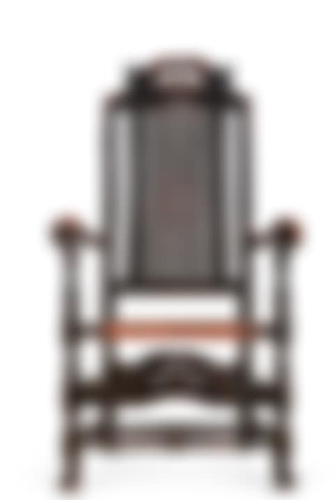 A JACOBEAN BLACK-PAINTED CANED AND CARVED BEECHWOOD ARMCHAIR (preview)