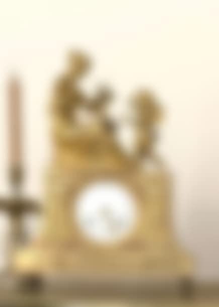 clock decorated with the allegory of Music, a woman playing the Lyre and a putti writing (preview)