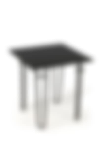 Wrought iron pedestal table in quadripod shape supporting a black tinted glass plate (preview)