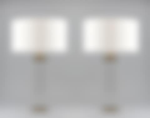 A pair of solid glass table lamps with metal bases (preview)