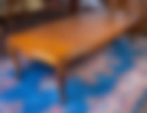 An extending dining table with parquetry decoration (preview)
