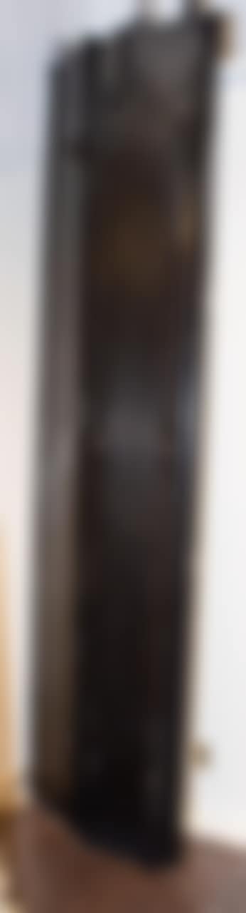 A black two piece metal folding gate (preview)