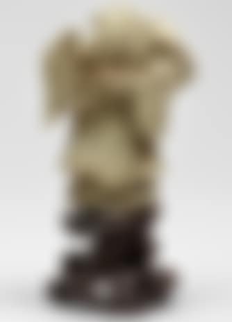 Standing deity holding bat (preview)