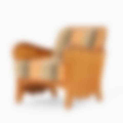 A "Lovö" stained pine armchair (preview)