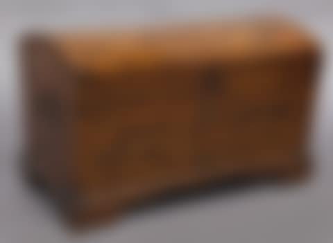 A South German inlaid walnut dome top coffer, inlaid with star bursts and fans, with small drawer at base, on bracket feet, and with brass handles (preview)