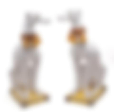 whippets seated on yellow cushions decorated with tassels and wearing collars with tassels (preview)