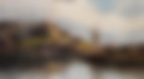 Company in a boat on a rocky coast (preview)