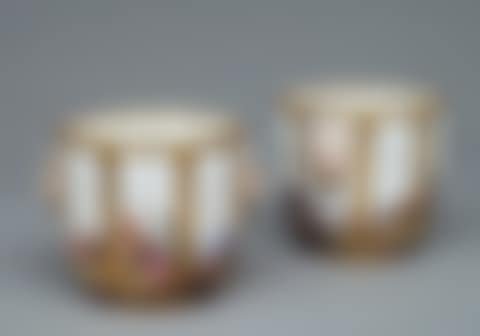 Pair of multicolored, gold-heightened ribbed glass containers with two handles in the shape of a satyr mask (preview)