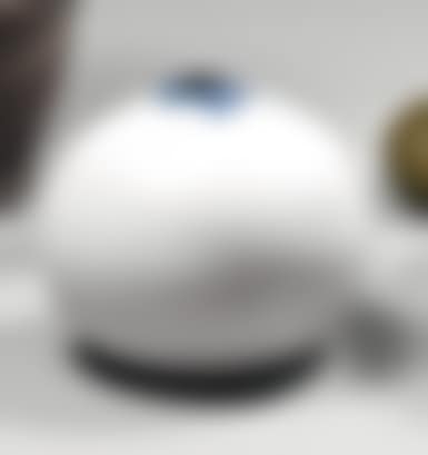 Ovoid-shaped ceramic vase with turquoise enameled cover (preview)