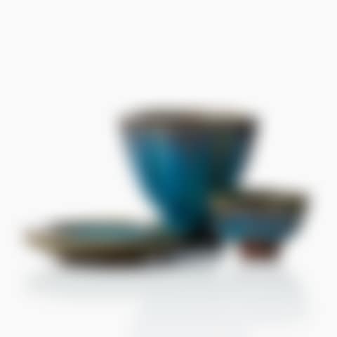 Bowls and saucers, three parts; A set of three Wilhelm Kåge "Farsta" stoneware vessels (preview)
