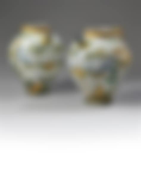 Important pair of earthenware chevrettes with globular bodies and double-rolled handles (preview)
