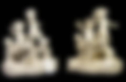 Pair of Italian glazed ceramic figural groups of putti (preview)