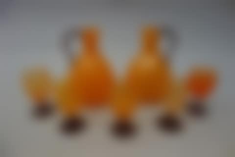 Two pitchers with detached side handles and small pouring spouts, and their five stemmed glasses. (preview)