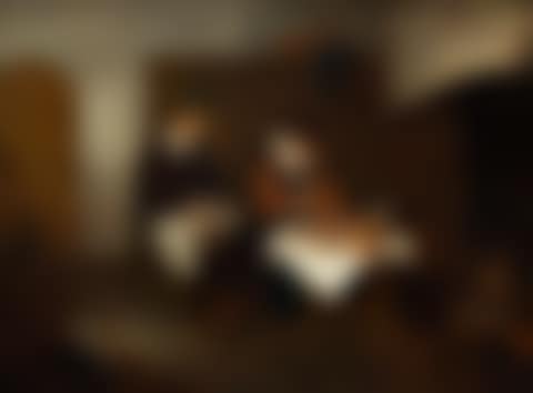 An elderly couple having dinner by the fireplace (preview)