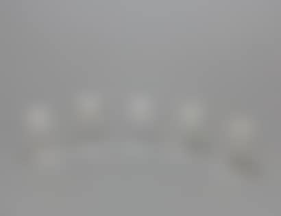 Five covered white glass bottles (preview)