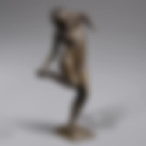 Dancer looking at the sole of her right foot (preview)