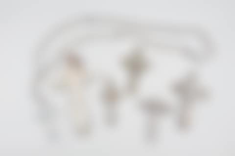 A set of four religious crosses and a rosary (preview)