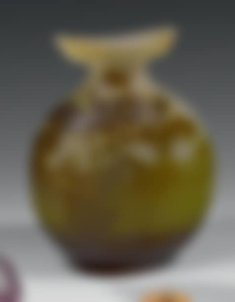 Round bottle with flat body and crescent moon cut-out neck (preview)