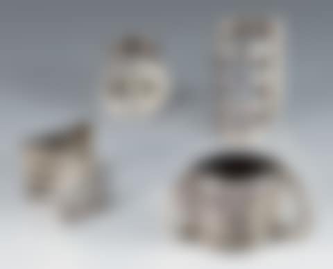 Set of four chrome metal napkin rings (preview)