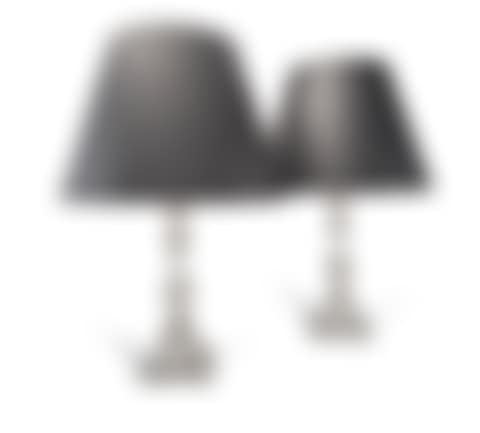 A PAIR OF CONTINENTAL SILVER CANDLESTICKS CONVERTED TO TABLE LAMPS (preview)