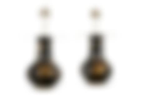 A PAIR OF MASSIVE MOLDED COMPOSITION EBONIZED AND PARCEL GILT BALUSTER VASES MOUNTED AS TABLE LAMPS (preview)