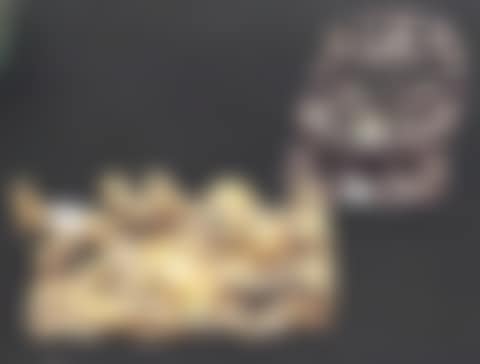 Wood carving depicting figures (Daoist Immortals) in a boat (preview)