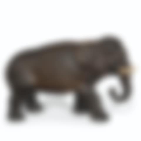 A FRENCH PAINTED TERRACOTTA FIGURE OF AN INDIAN ELEPHANT  (preview)
