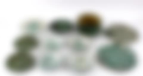 a set of four tin glazed circular dishes (preview)